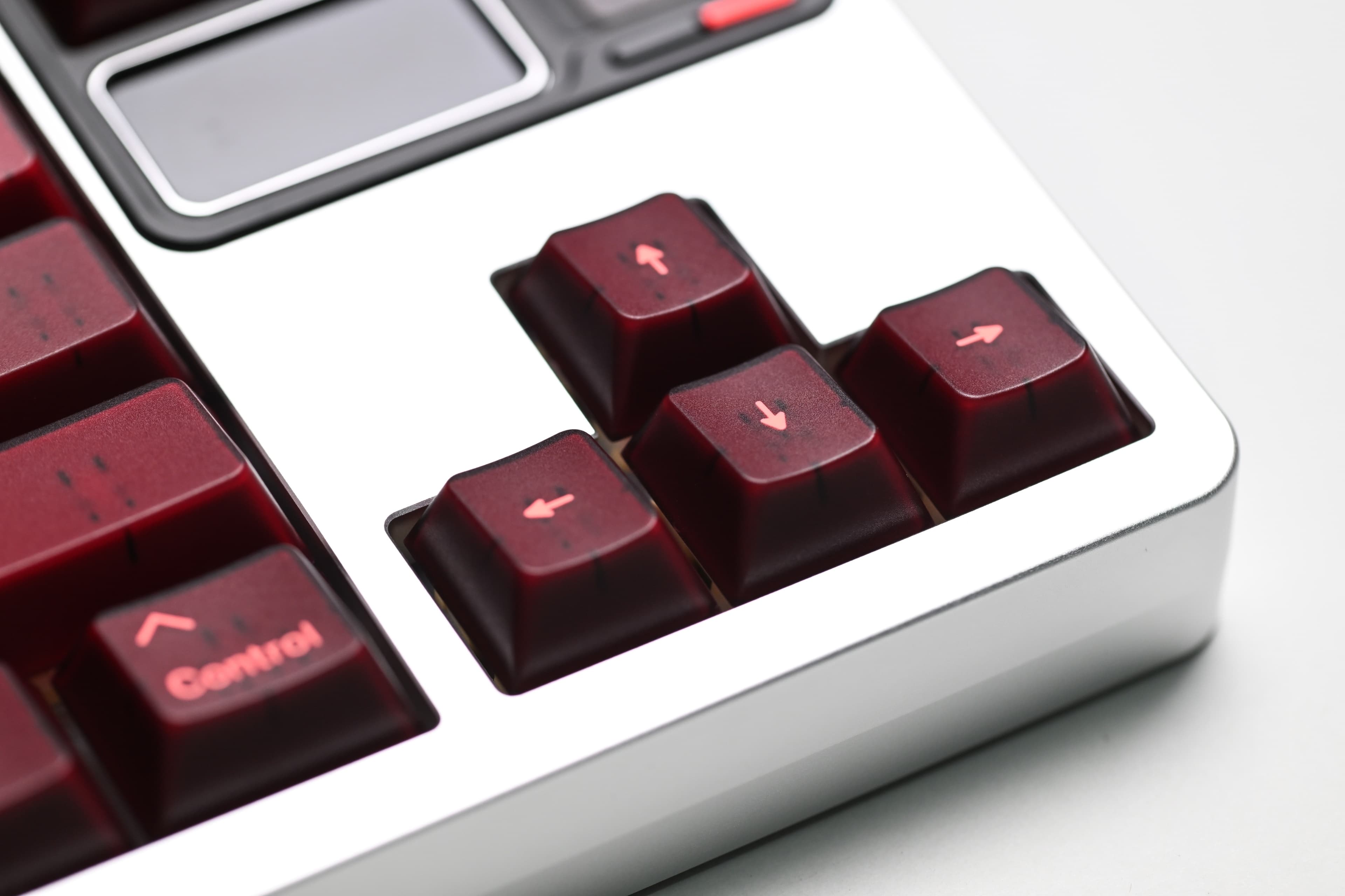 KAP Generation — a set of bright pink and translucent maroon keycaps image 4